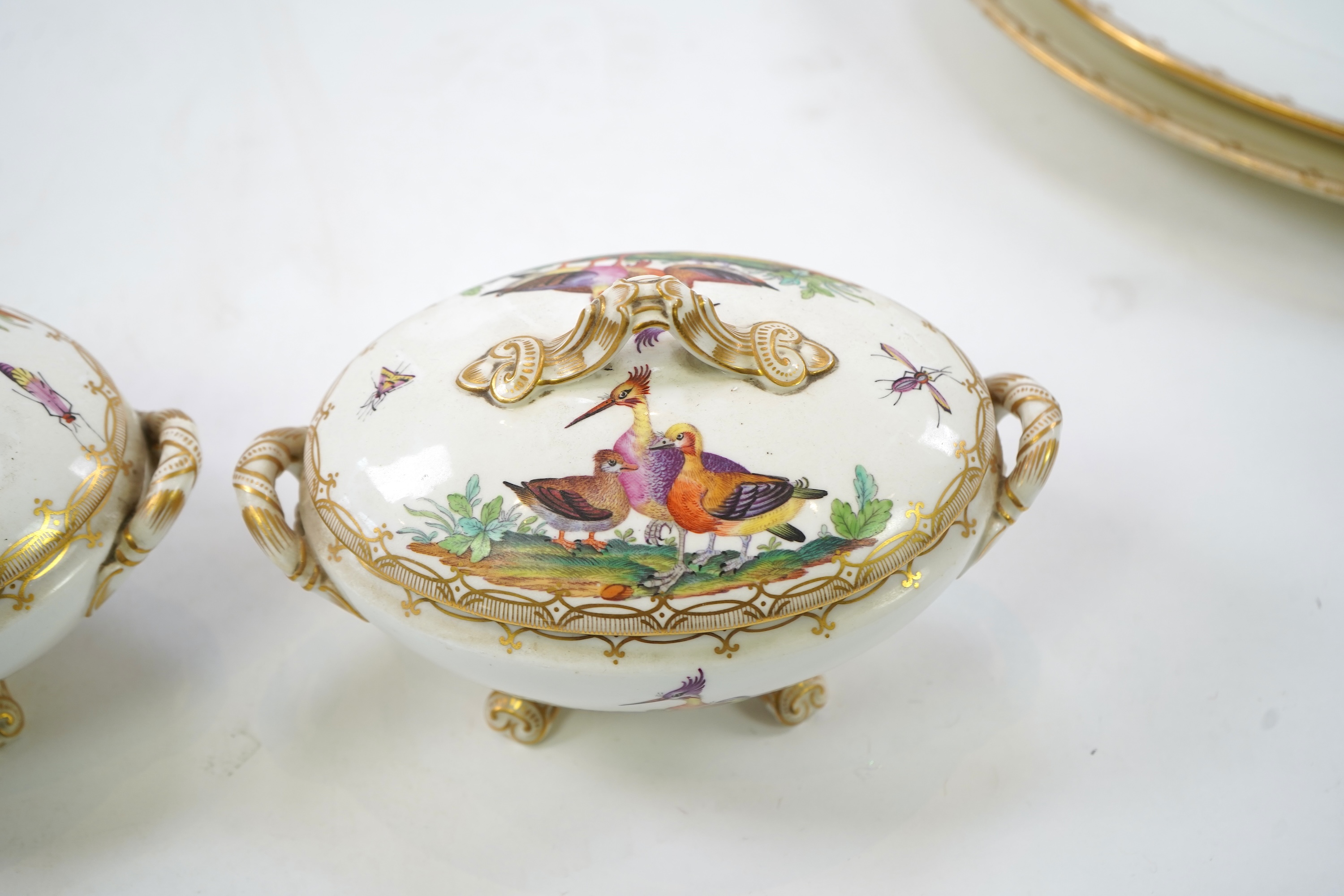 A Coalport bird painted part dinner service, mid 19th century